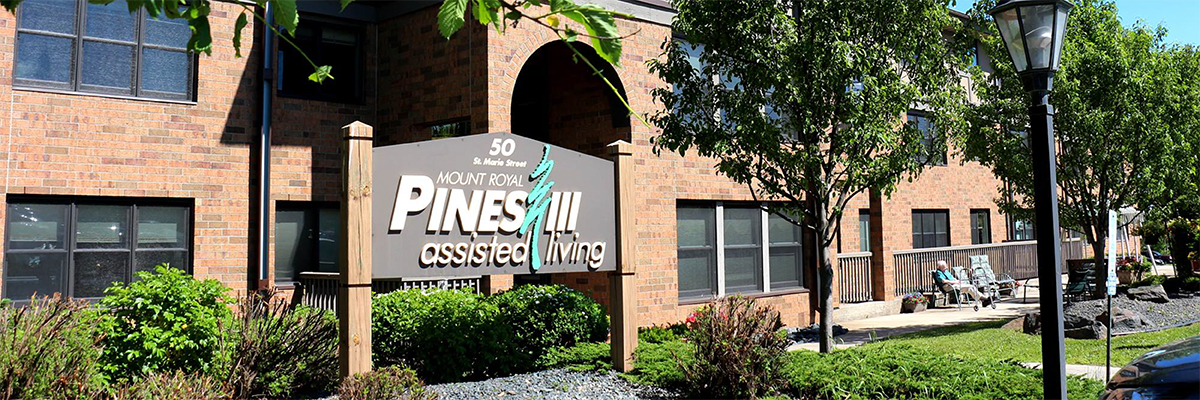 Mount Royal Pines III assisted living sign & red brick exterior